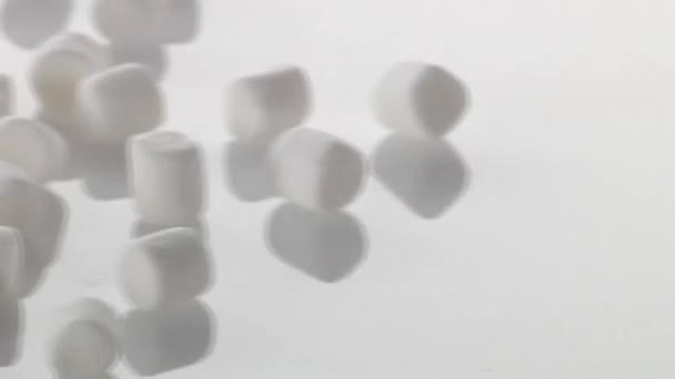 Veel witte marshmallows. — Stockvideo