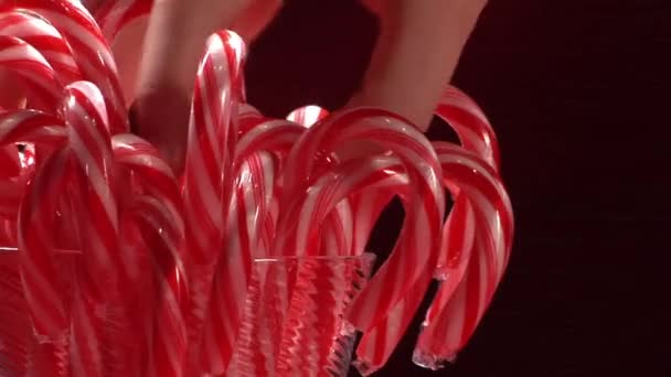 Red and white striped candy canes — Stock Video