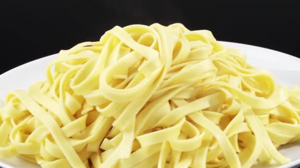 Steaming ribbon pasta — Stock Video