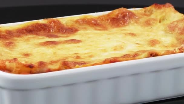 Lasagne in a baking dish — Stock Video