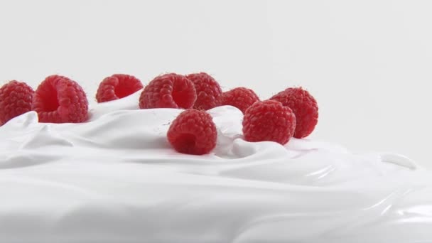 Cream with fresh raspberries — Stock Video