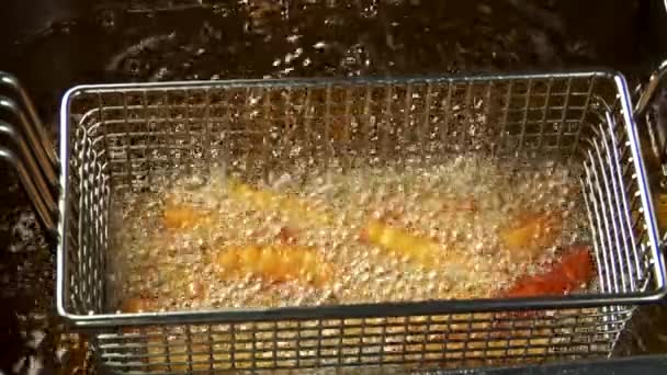Deep-frying chips — Stock Video