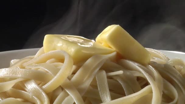 Pasta with knobs of butter — Stock Video