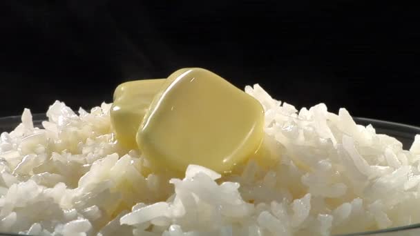 Arroz con perillas de mantequilla — Vídeos de Stock