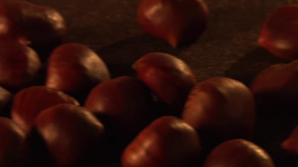 Hot chestnuts and a knife — Stock Video