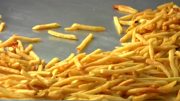 Chips with a chip scoop — Stock Video