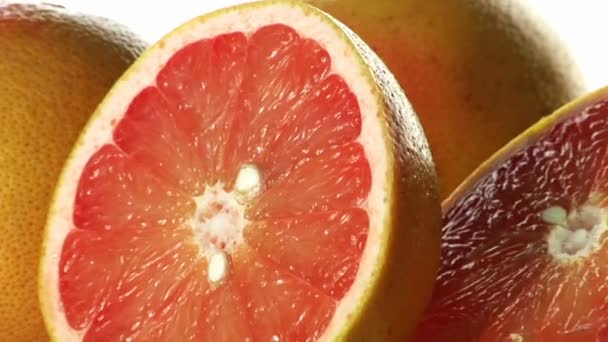 Grapefruits, whole and halved — Stock Video