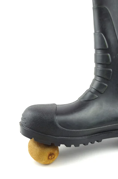 Black rubber boots with kiwi — Stock Photo, Image