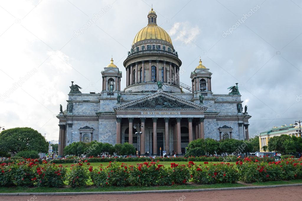 St. Isaac's Cathedral and the growing of a rose on St. Isaac's square in the summer in St. Petersburg