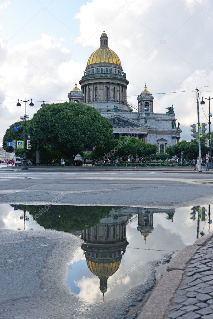 St. Isaac's Cathedral and its reflection on wet pavement