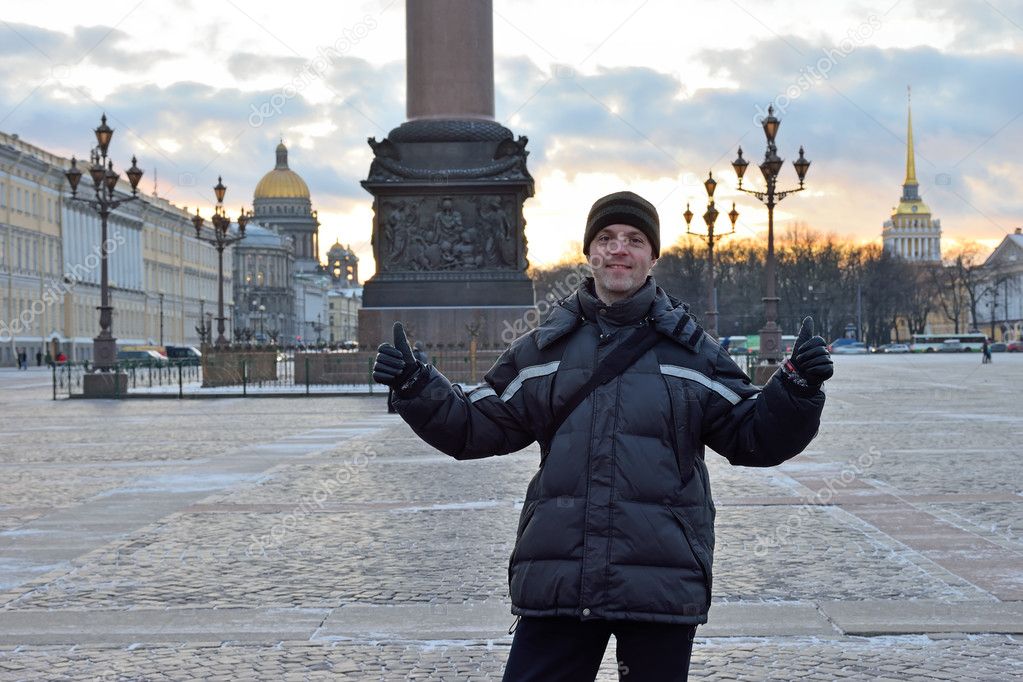 Happy tourist at the Palace square in St. Petersburg