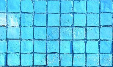 Mavi mozaik tuğla duvar, grafiti dokusuna yakın, yaratıcılık için canlı renklerle, yaratıcı arka planlar ve fikirler..