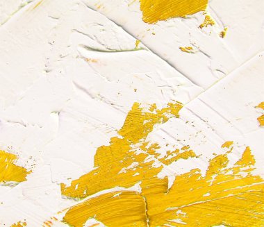 İlginç ve dinamik arkaplanlar için beyaz ve sarı fırça darbelerine sahip soyut arkaplan dokusu