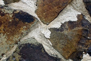 İlginç, yaratıcı arka planlar için taş duvar.