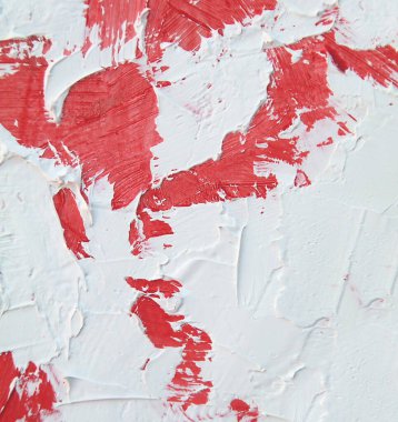 Canlı, renkli ve yaratıcı arka planlar için kırmızı ve beyaz renklere sahip yakın plan boyama. Tuval üzerine yağ. Palet bıçağı ve fırça darbeleri dokusu.