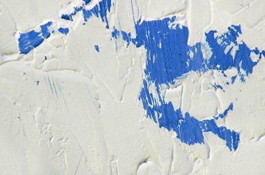 Canlı, renkli ve yaratıcı arka planlar için kırmızı ve beyaz renklere sahip yakın plan boyama. Tuval üzerine yağ. Palet bıçağı ve fırça darbeleri dokusu.