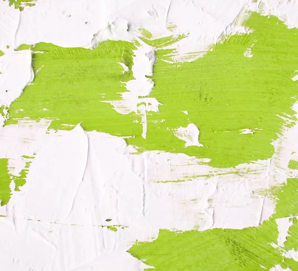 İlginç ve dinamik arka planlar için yeşil ve beyaz fırça darbeleriyle yağlı boya dokusu. Web tasarım kalıpları için uygun