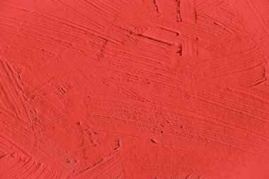 İlginç, yaratıcı ve yaratıcı arka planlar için kırmızı dokuyu boyamak.