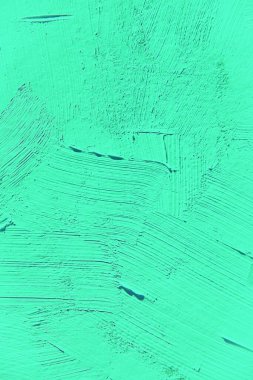 Yakın plan boyama. Açık yeşil renkli arka plan. Canlı, renkli, yaratıcı arkaplanlar için. Tuvaldeki yağ fırça darbelerinin dokusunu etkiler. Web ve tasarım için.