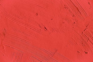 İlginç, yaratıcı ve yaratıcı arka planlar için kırmızı dokuyu boyamak.