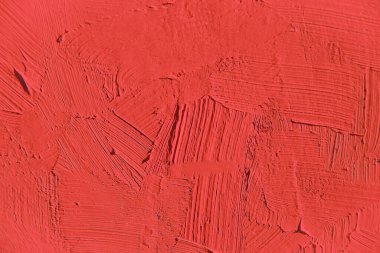 İlginç, yaratıcı ve yaratıcı arka planlar için kırmızı dokuyu boyamak.