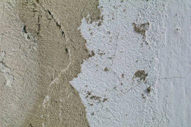 çatlakları ve çizikleri olan bir duvarın dokusu arka plan olarak kullanılabilir.