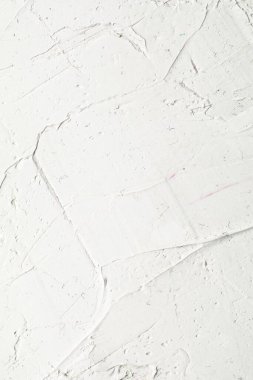 İlginç ve modern arka planlar için fırça darbeleri ve palet bıçaklı beyaz doku. Web tasarımı ve duvar kağıtları için uygun.