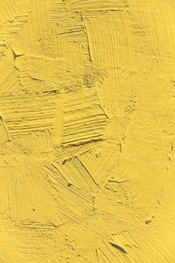 İlginç, yaratıcı ve yaratıcı arka planlar için çuha çiçeği sarısı pantolon rengi dokusunu boyamak. Web ve tasarım için.