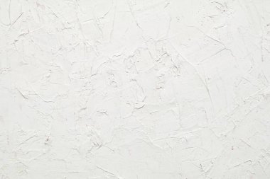 İlginç ve modern arka planlar için fırça darbeleri ve palet bıçaklı beyaz doku. Web tasarımı ve duvar kağıtları için uygun.