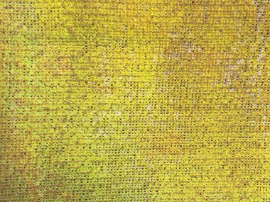 Arkaplanlar, duvar kağıtları, dokular ve ilginç yaratıcı fikirler için sarı renkli tuval dokusu