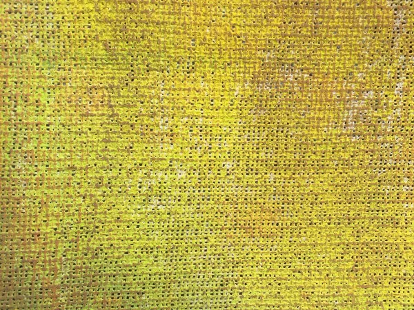 Arkaplanlar, duvar kağıtları, dokular ve ilginç yaratıcı fikirler için sarı renkli tuval dokusu