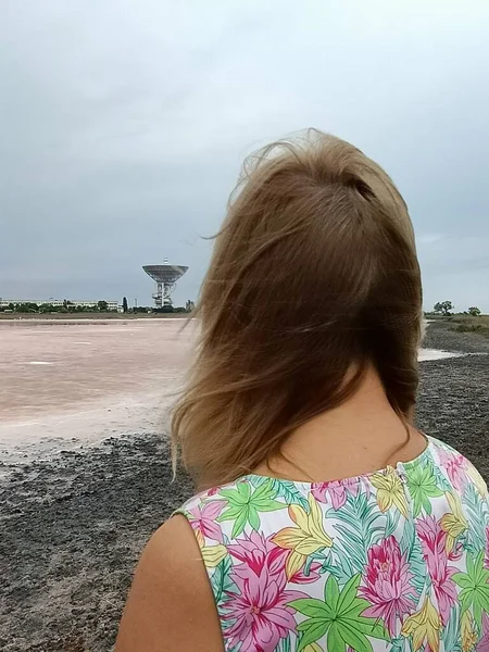 Cosmic radar at the dried pink salt lake in bad weather