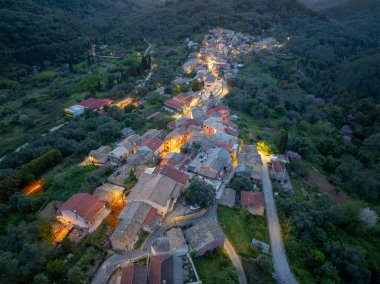 Top Down Aerial Drone Perspective of Traditional Red Roof Houses in Zygos Village Corfu Greece Mountainous Ionian Settlement Surrounded by Olive Trees and Nature