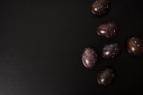 Svart galaxy ägg på svart bakgrund — Stockfoto