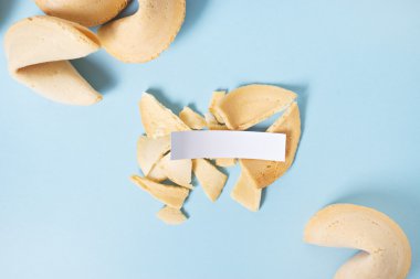 Fortune cookies on the blue background clipart