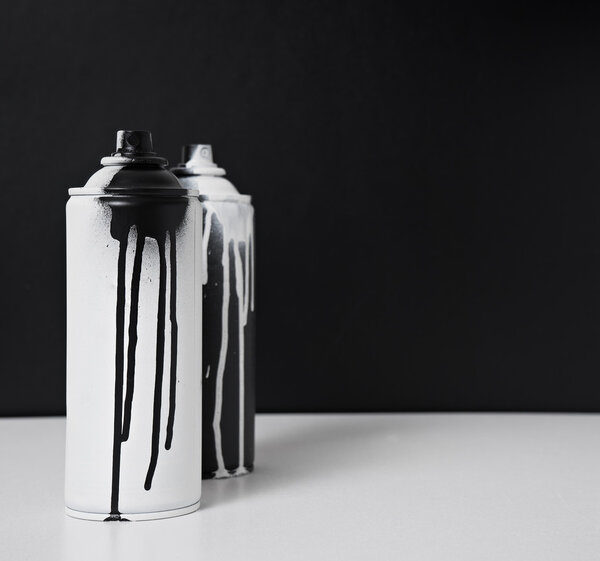 black and white spray paint bottle