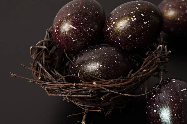 Black galaxy eggs at black background — Stock Photo, Image