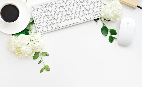 Office desk table with computer, supplies and coffee cup — Stock Photo, Image