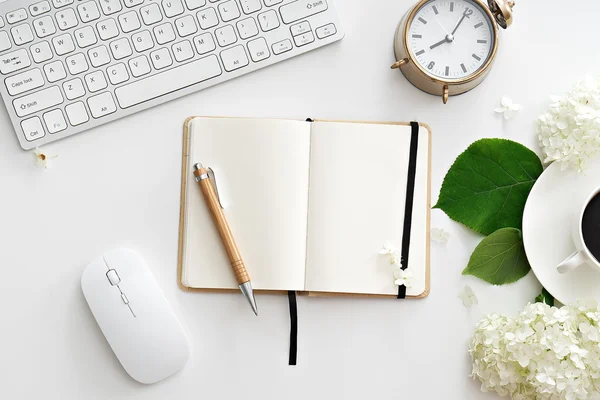 Office desk table with computer, supplies and coffee cup — Stock Photo, Image