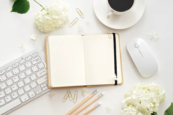 Office desk table with computer, supplies and coffee cup — Stock Photo, Image