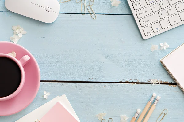 Office desk table with computer, supplies and coffee cup — Stock Photo, Image