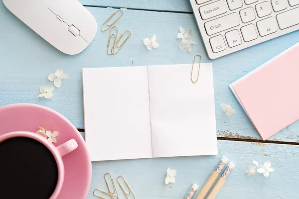 Office desk table with computer, supplies and coffee cup — Stock Photo, Image