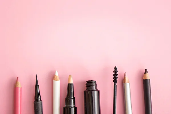 Set of cosmetic products on pink background — Stock Photo, Image