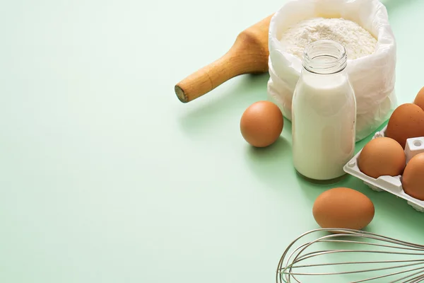 cooking ingredients and kitchen tools on table