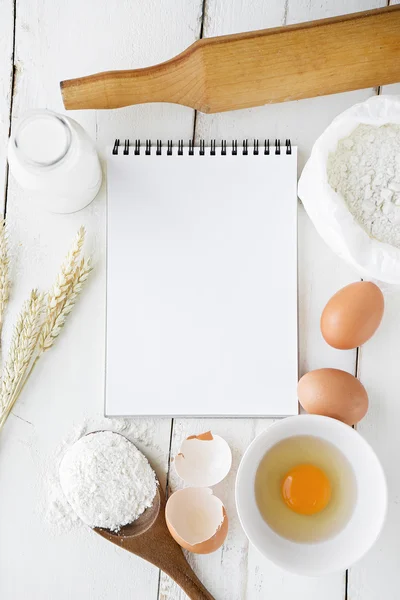 cooking ingredients and kitchen tools on table