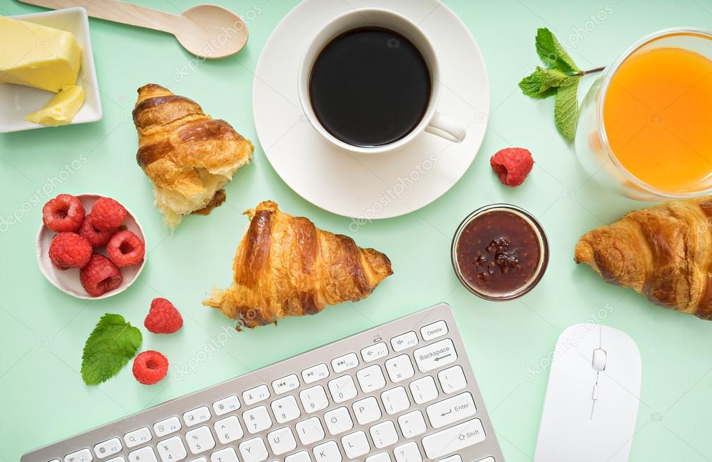 croissants and coffee at workplace