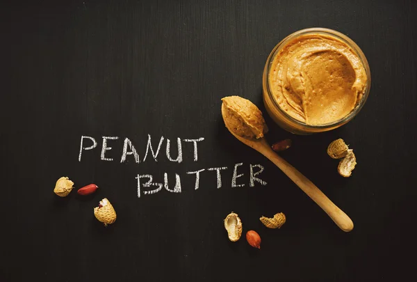 Peanuts and Fresh peanut butter on  background — Stock Photo, Image