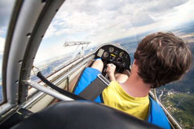 pilot in the cockpit of a glider clipart