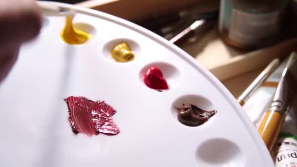 Paleta de pintura. Mistura de cores . — Vídeo de Stock