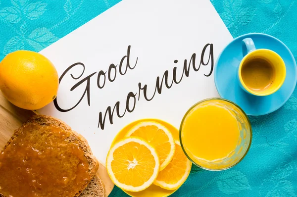 Good morning with orange juice, bread and jam